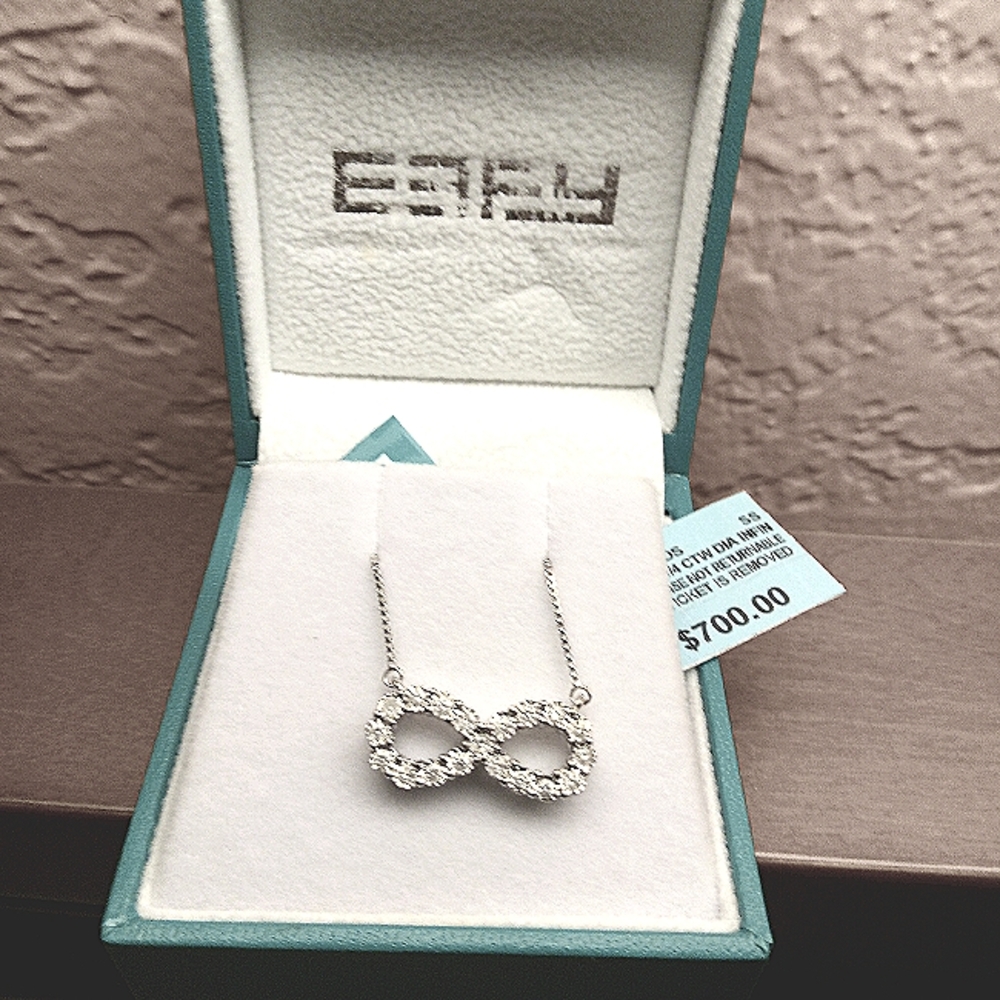 1/4 ctw Infiniti diamond necklace SS